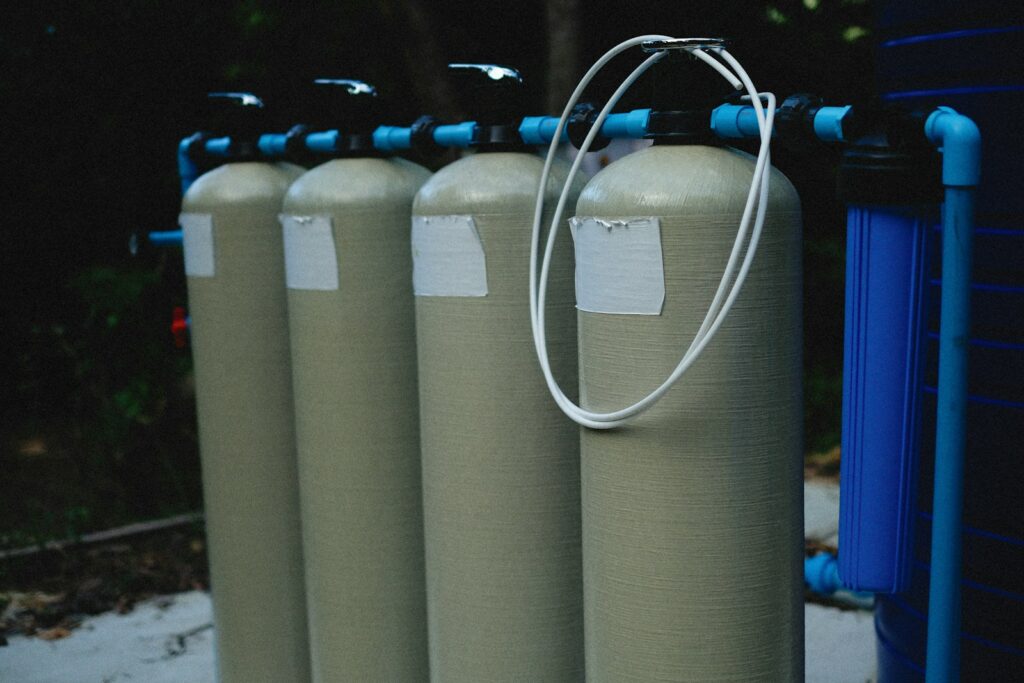 a row of water filtrators sitting next to each other